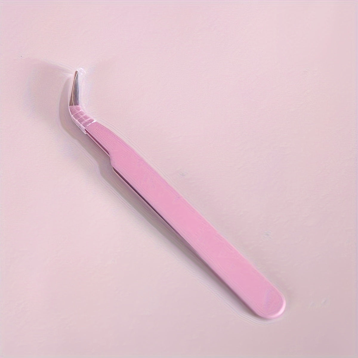 Pinza curva para pestañas